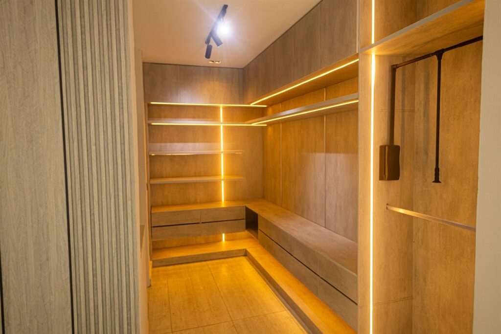 Brum Height 6: Illuminated dressing area with hanging rails and storage